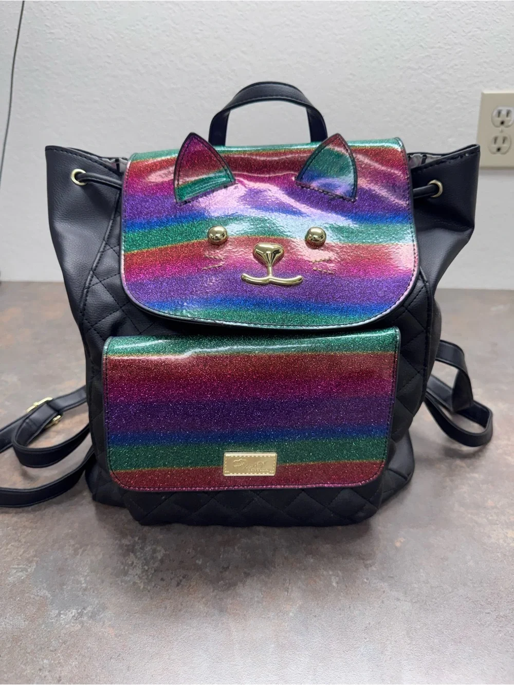 Betsey Johnson Black Quilted Backpack with Rainbow Cat Flap